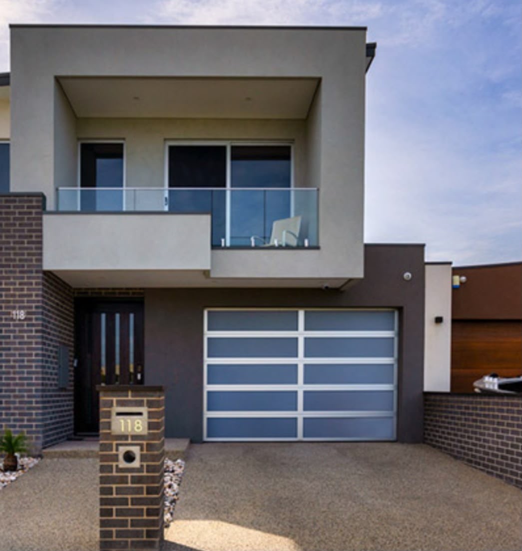 Contemporary Melbourne home with grey glass-panel garage door